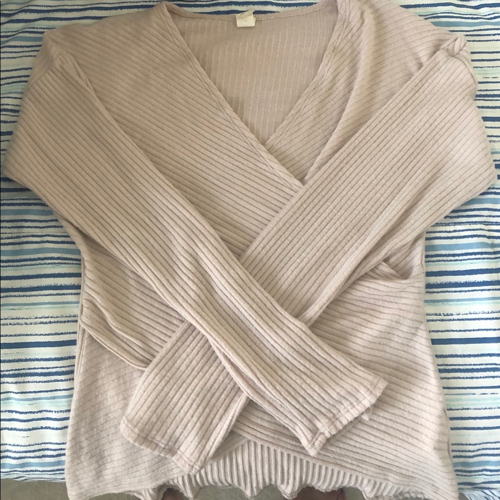 A long sleeve wrap style cotton top